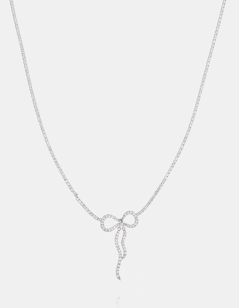 Collar en metales nobles con baño de platino, moño y topacios blancos Festive Style