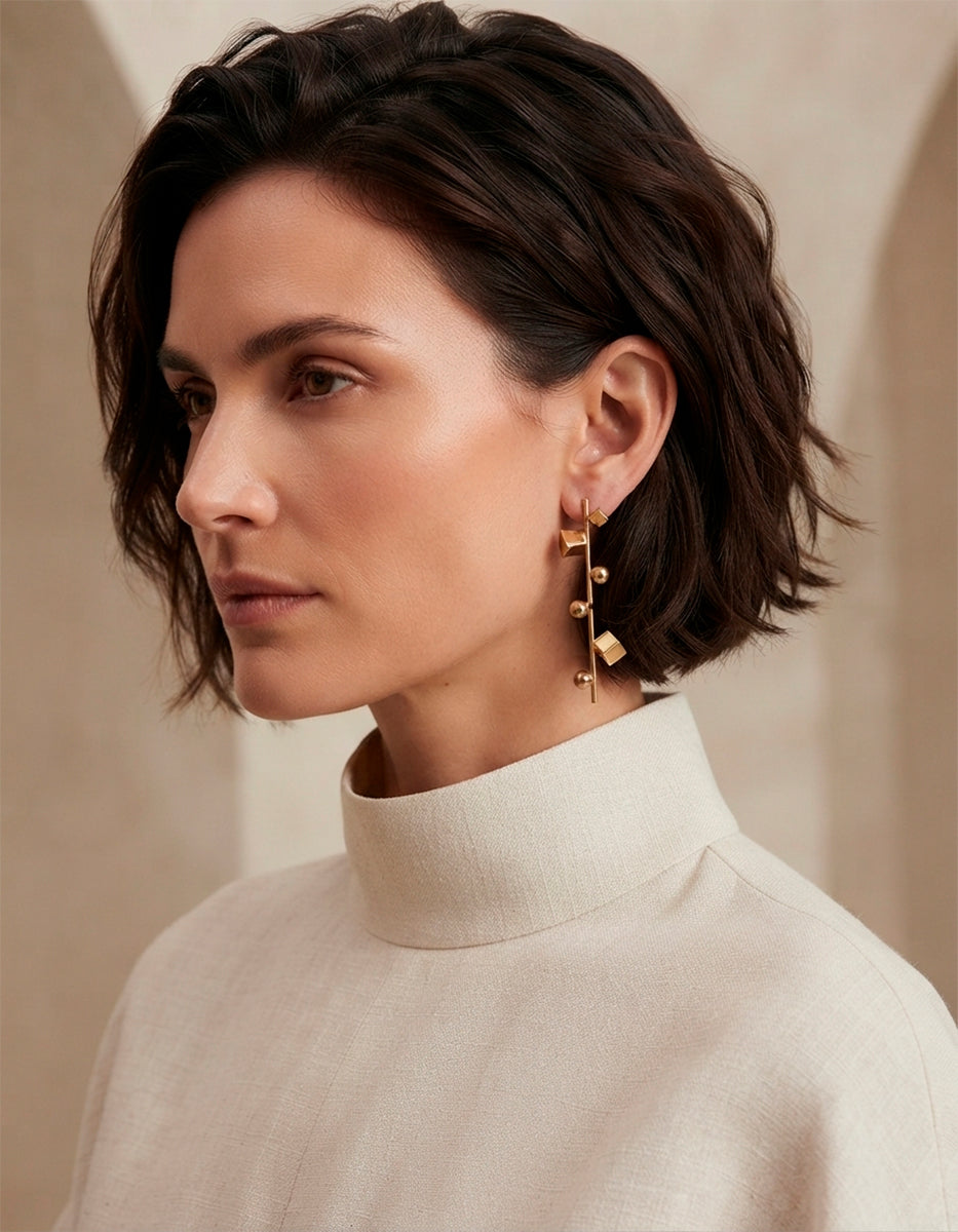 Pendientes bronce con baño oro 22k cubos Mexican Geometry