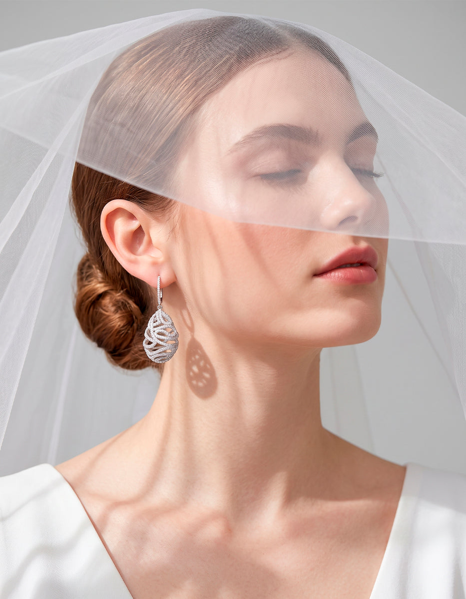 Arete gota & 400 topacios blancos montados corte diamante Infinito Elite