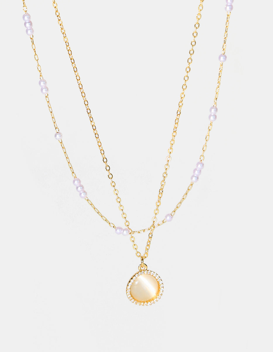 Set de Collar y Pendientes en Plata 925 bañados en Oro de 22 Kilates con Perla Mabe