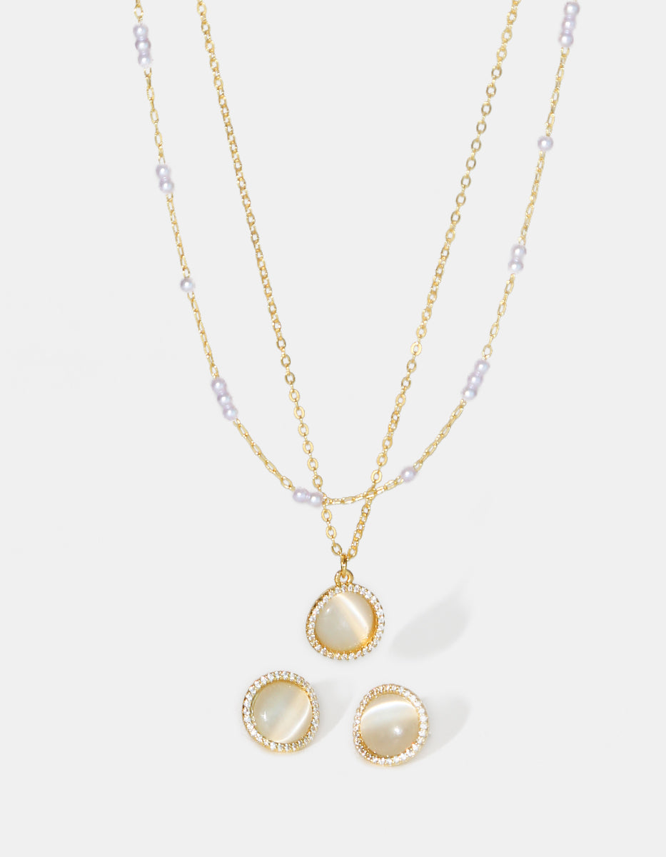 Set de Collar y Pendientes en Plata 925 bañados en Oro de 22 Kilates con Perla Mabe