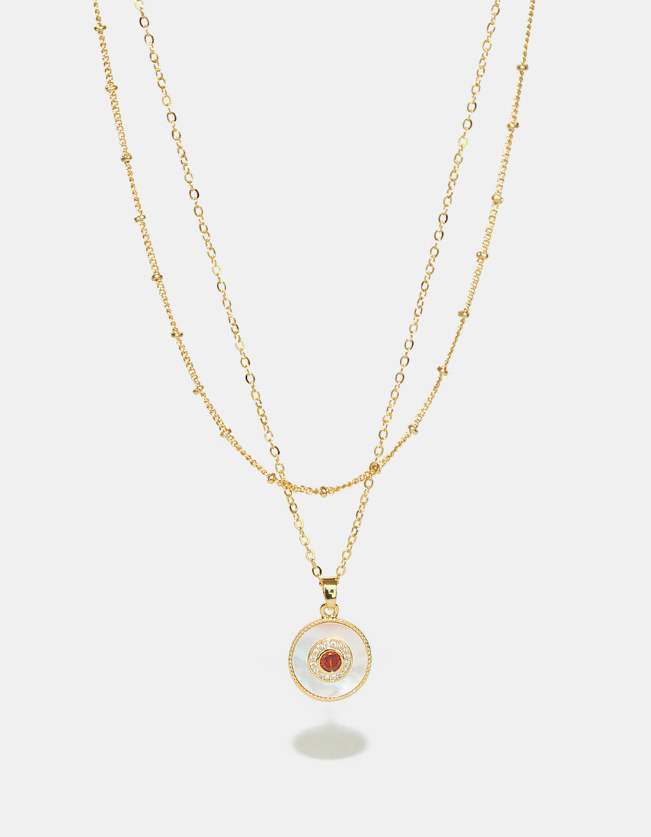 Set de Collar y Pendientes en Metales Nobles bañados en Oro de 18 Kilates con Gema Rojo Anaranjado